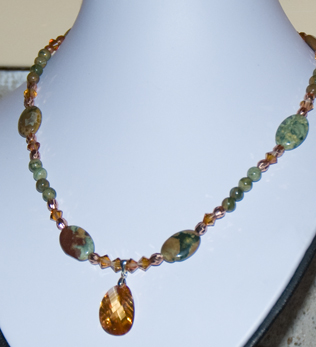 rhyolite ovals and beads copper